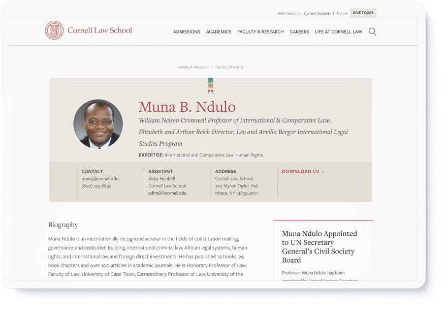 Cornell Law's website on a sideways tablet with the faculty profile for Muna B. Ndulo