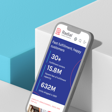 the Radial mobile site with stats on a mobile screen leaning against a box