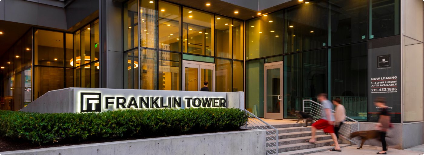Exterior of the Franklin Tower property with new signage outside
