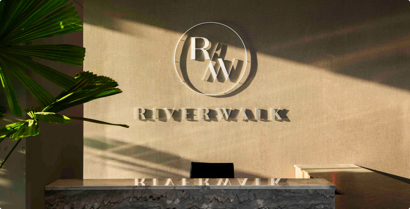 the Riverwalk logo over the lobby desk