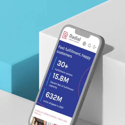 the Radial mobile site with stats on a mobile screen leaning against a box