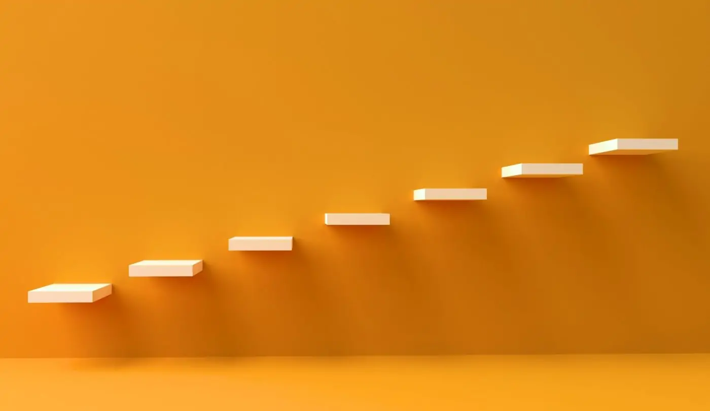 Symbolic photo of stairs against a vibrant yellow background.