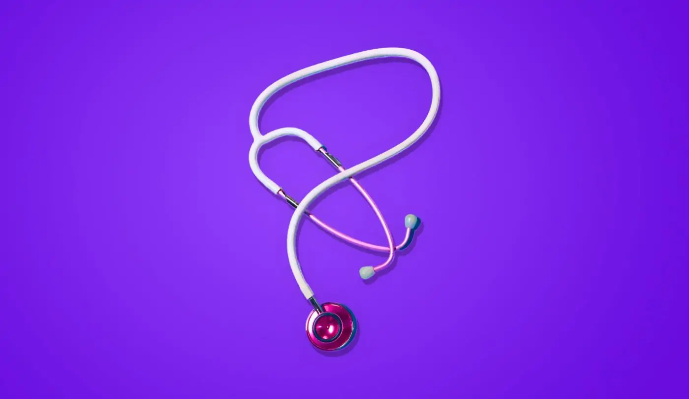 An image displaying a stethoscope resting on a vivid purple backdrop.