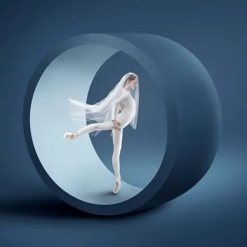 A ballerina en pointe dressed in all white standing in a sculptural wheel highlighting the beauty and drama represented by the Philadelphia Ballet.