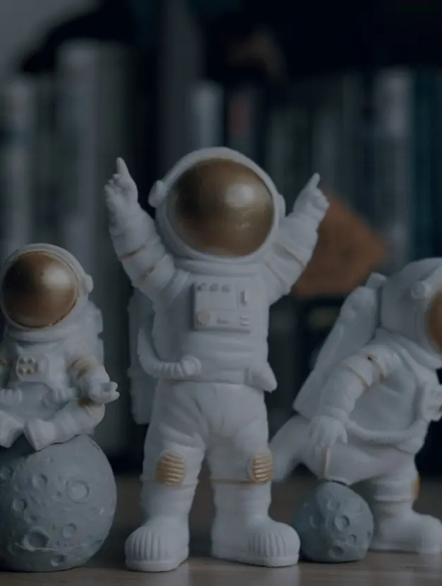 Astronaut figurines in various poses