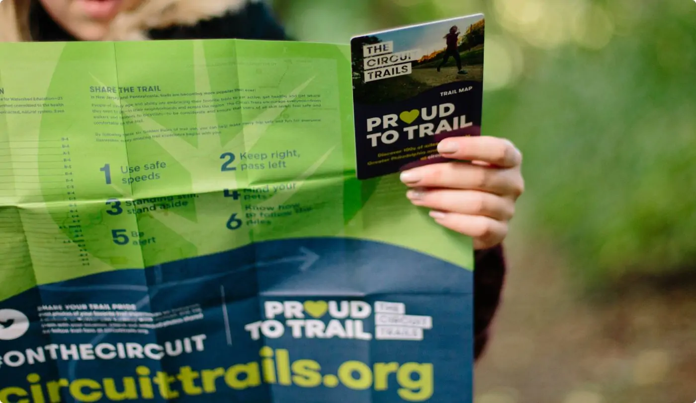 Woman using the newly design circuit trail map