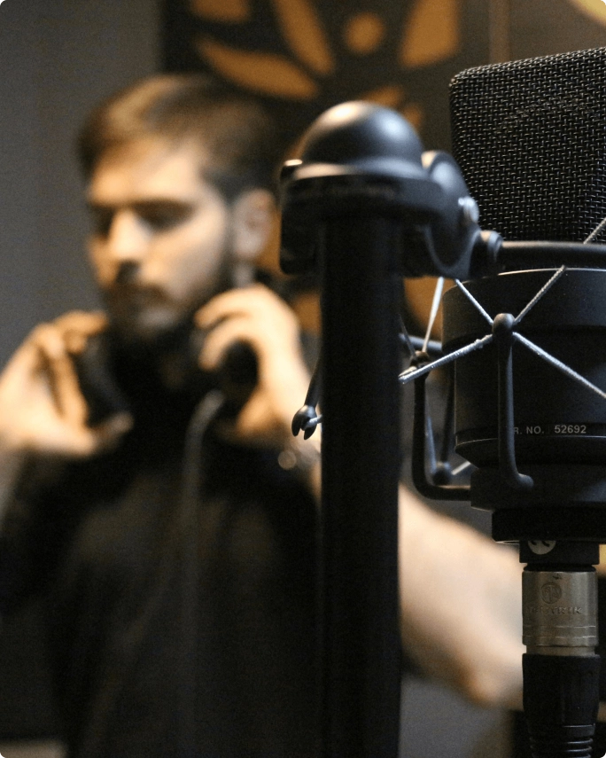 A musician in a recording studio.