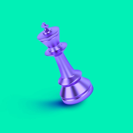 Purple metallic chess king piece tilted on a teal background, symbolizing strategic power or leadership in a digital or futuristic context.