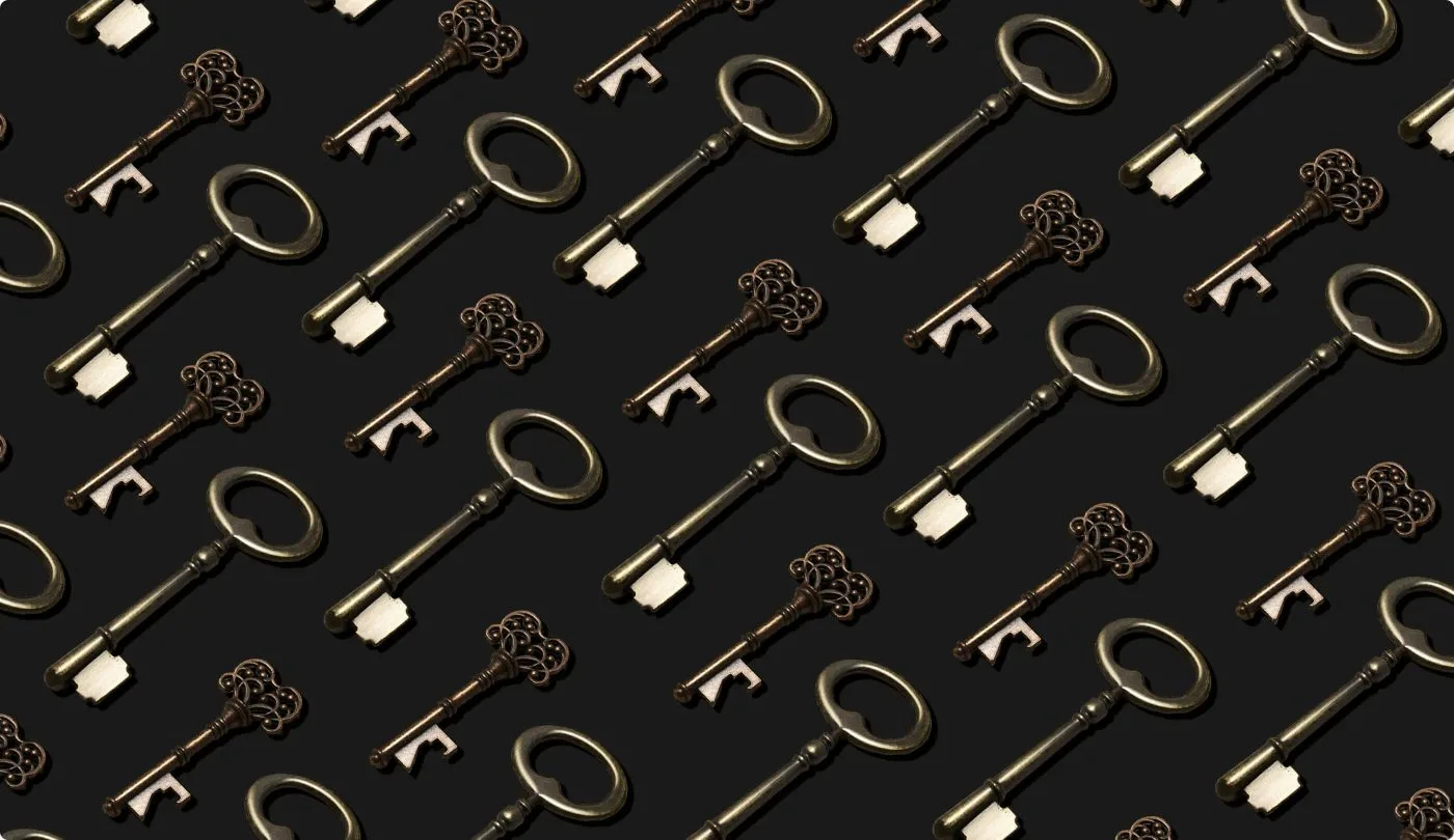 Seamless pattern of vintage brass and bronze skeleton keys on a charcoal background, symbolizing access and hidden knowledge.