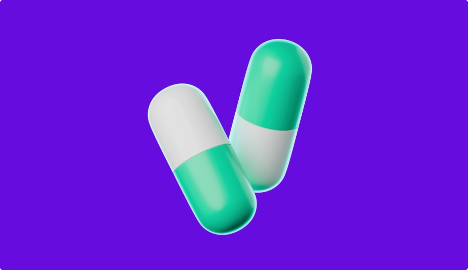 3D illustration of two green and white capsule pills on a solid purple background.